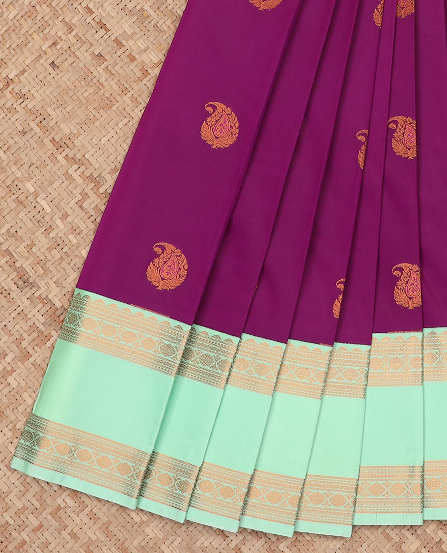 Purple Budget Silk Saree Delicately Woven with Paisley Buttas, Complemented with a Contrast Traditional Zari Design Rettai Pettu Border, Pallu Subtly Woven in Buttas, and Comes with a Contrast Blouse