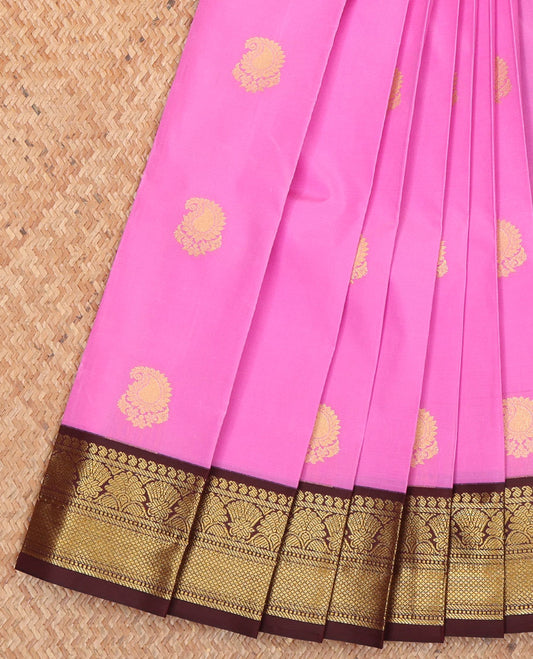 Pink Budget Silk Saree, Enriched with Paisley Zari Buttas All Over Its Body, Complemented by a Contrast Border of Traditional Designs, a Grand Pallu of Jaal Designs, and Paired with a Contrast Blouse