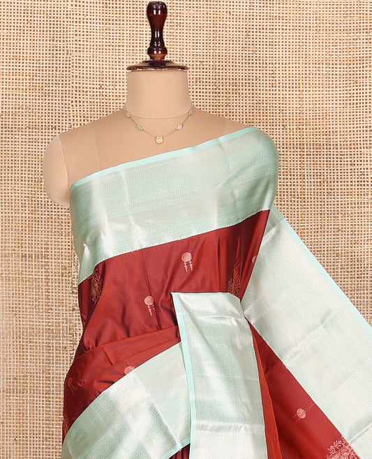 Red Budget Silk Saree, Prettified with Zari Buttas All Over Its Body, Complemented by a Contrast Traditional Zari Designs Woven Border, Opulently Embellished Pallu, and Paired with a Contrast Blouse