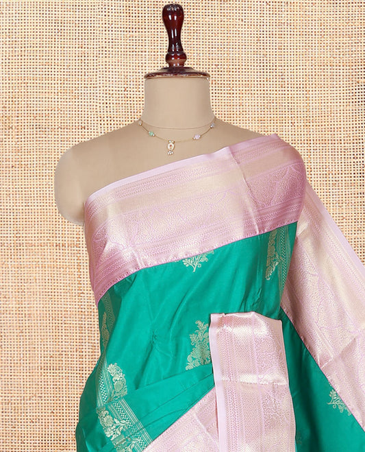 Green Budget Silk Saree, Prettified with Zari Buttas on Its Body, Complemented by a Contrast Traditional Zari Design Border, Grandly Decked Up Pallu, and Paired with a Contrast Blouse