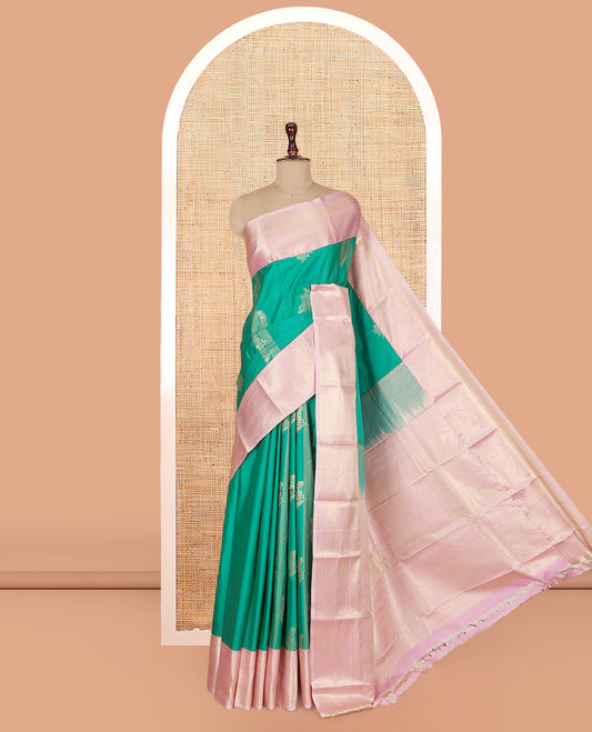 Green Budget Silk Saree, Prettified with Zari Buttas on Its Body, Complemented by a Contrast Traditional Zari Design Border, Grandly Decked Up Pallu, and Paired with a Contrast Blouse