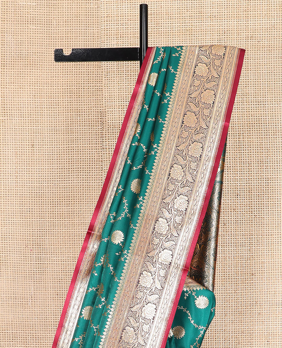 Green floral jaal jacquard banarasi silk saree, contrast floral creeper design border, and intricate ogee patterned pallu