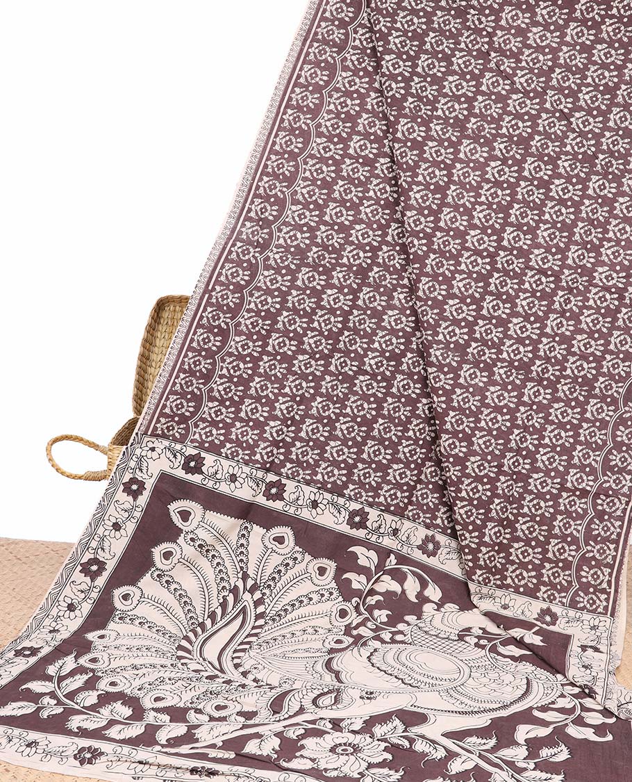 Red batik machine-printed kalamkari cotton saree, self-border & pallu of peacock motifs