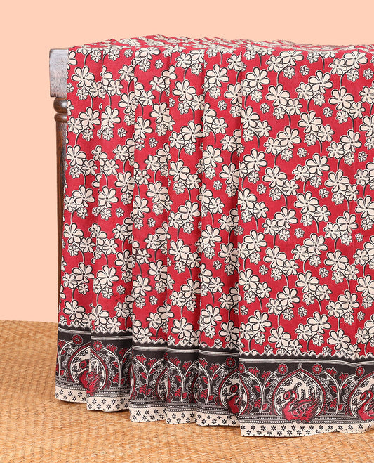Red floral design machine-printed kalamkari cotton saree with contrast swan design border & animal motifs pallu