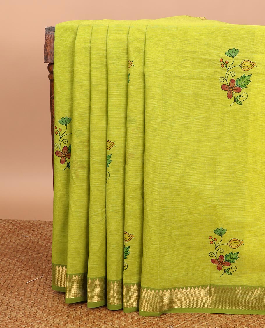 Green base colorful floral motifs printed Chirala cotton saree, traditional border, and pallu of floral buttas