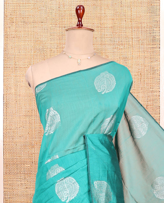 Borderless Green Semi-Silk Cotton Saree, Beautified with Zari Buttas All Over Its Body, Complemented by Contrast Jaal Patterned Pallu, and Paired with a Contrast Blouse