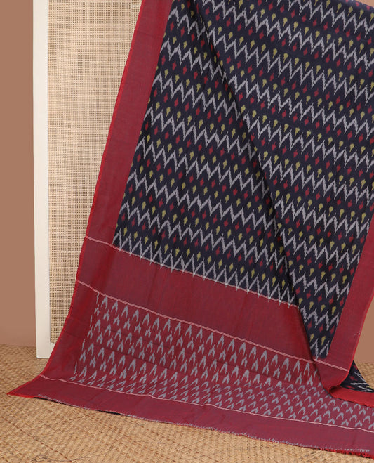 Navy blue chevron-patterned ikkat cotton saree, contrast plain border & pallu of ikkat design