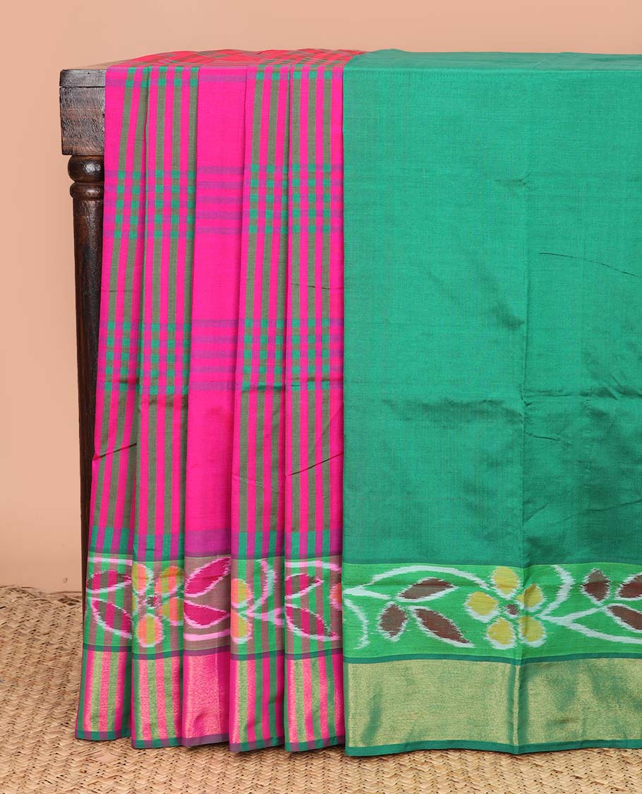 Pink checked design poly cotton saree, floral creeper border, and thick zari striped pallu