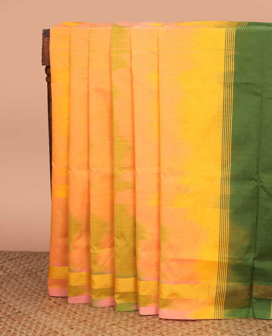 Yellow ikkat poly cotton saree, zari border, and contrast striped pallu