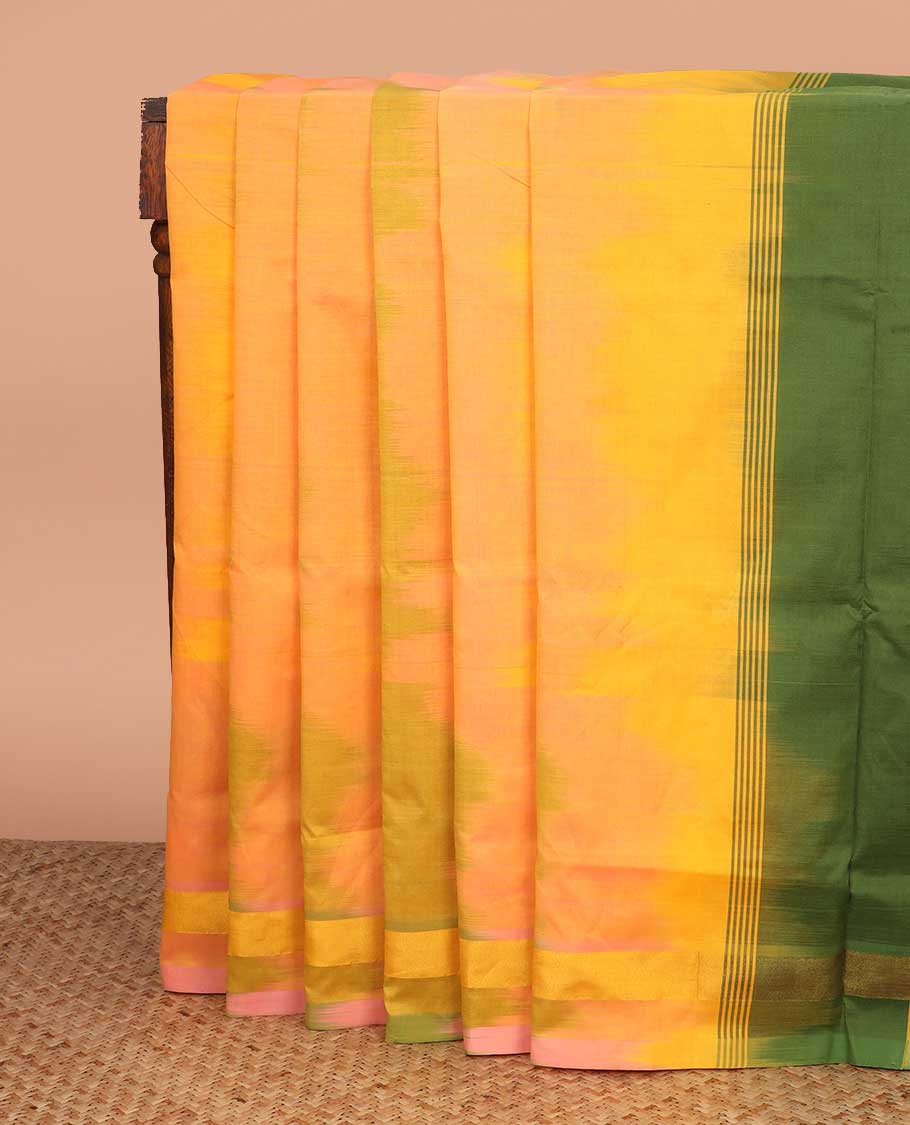 Yellow ikkat poly cotton saree, zari border, and contrast striped pallu