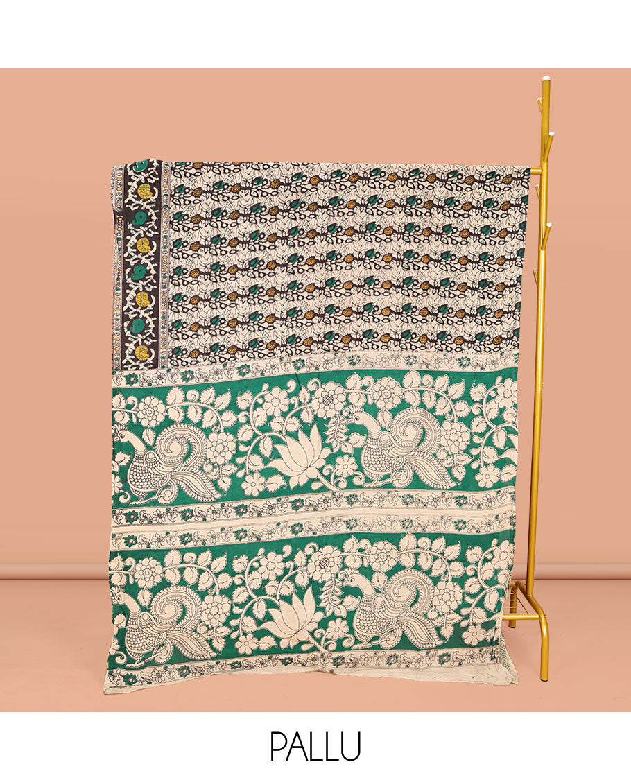 Multi-Color Machine-Printed Kalamkari Cotton Saree, Decked Up with Batik Vines on Its Body, Complemented  by a Contrast Border of Batik Paisley Print, Pallu of Floral-Peacock Print, and Paired with a Printed Blouse