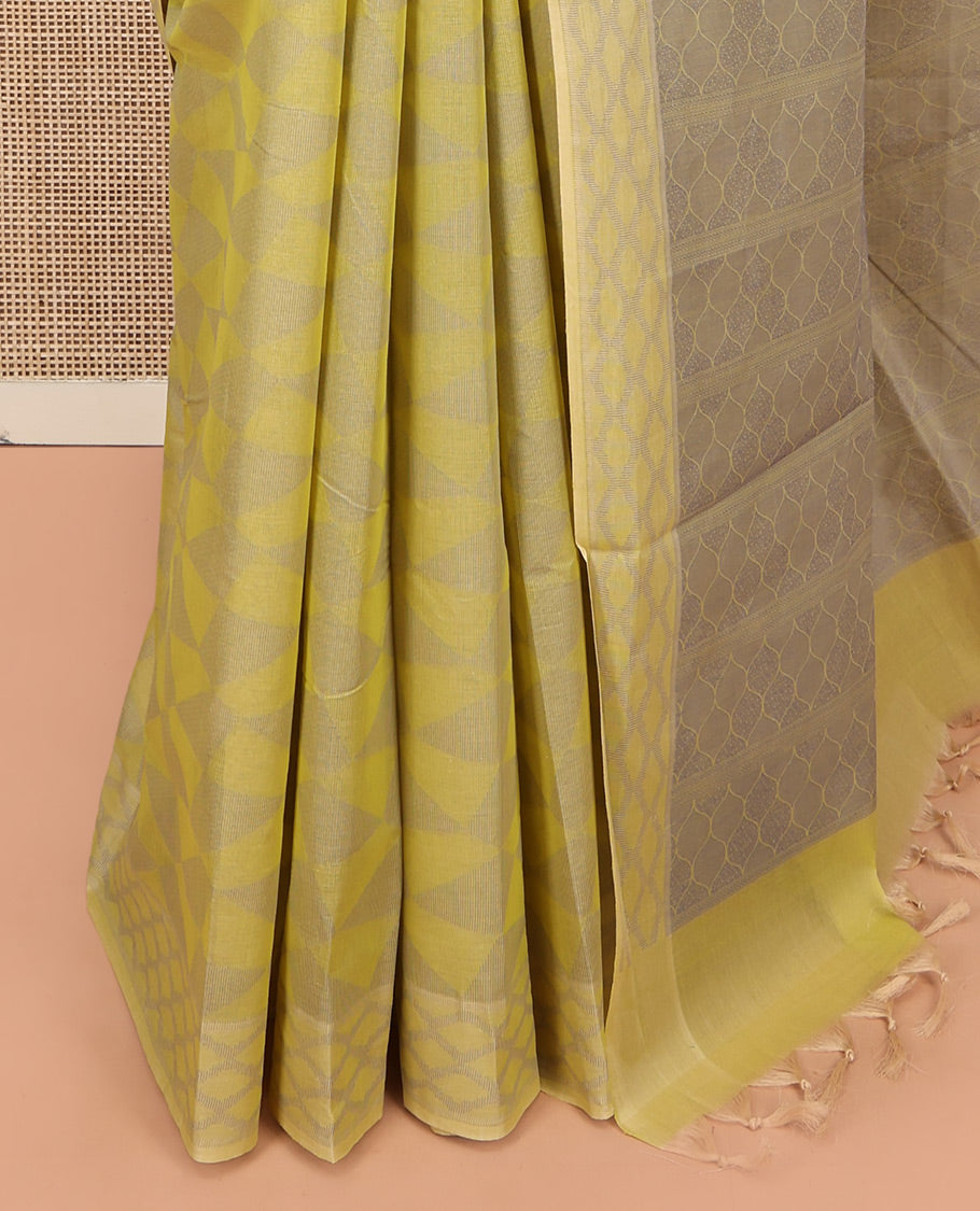 Pale Green Coimbatore Cotton Saree, Subtly Sparkled with Geometric Design on Its Body, a Subtle Diamond Border, Pallu of Ogee Patterns, and Paired with Matching Blouse