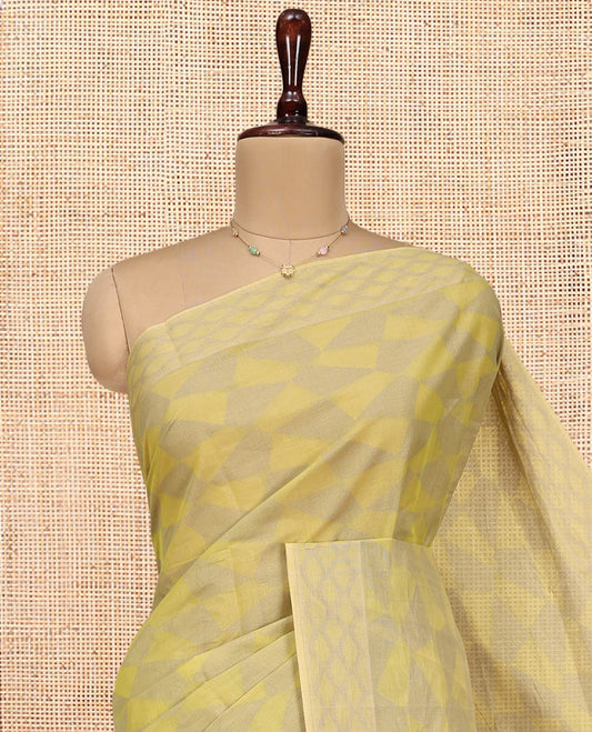 Pale Green Coimbatore Cotton Saree, Subtly Sparkled with Geometric Design on Its Body, a Subtle Diamond Border, Pallu of Ogee Patterns, and Paired with Matching Blouse