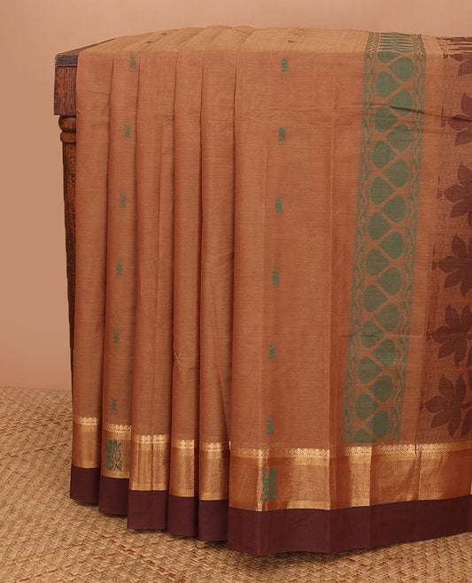 Brown unique buttas kanchi cotton saree, contrast border of zari & thread motifs, & pallu of floral designs