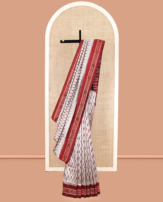 Grey-Red Pochampally Ikat Silk Saree, Adorned with Ikat Buttas, Complemented by a Contrast Ikat Border, Ikat-Style Pallu, and No Blouse