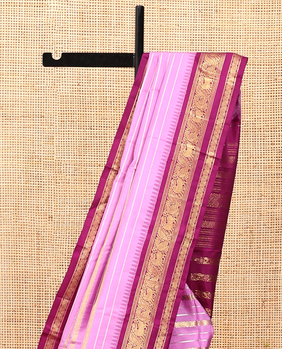 Pink Kanchipuram Designer Silk Saree, Majestically Detailed with Zari Stripes, Contrast Temple Border of Muthu, Banaras, Yaali, Mayil, and Jada Nagam, Geometric Pallu, and a Contrast Blouse