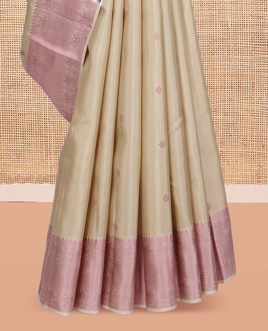 Beige Kanchipuram Silk Saree, Beautifully Bedecked with Thread Buttas, a Self-Border of Thilakam Mokku, Iruthalai Pakshi, and Kuyil Kann, Jaal Pallu, and a Matching Blouse