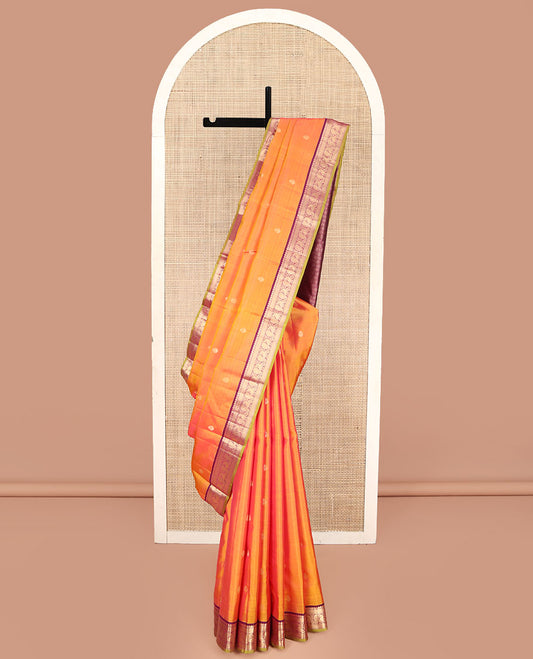 Orange Kanchipuram Silk Saree, Mesmerized with Zari Buttas on Its Body, Complemented by a Contrast Border of Muthu, Mayil Kann, and Mayil Designs, Grand Jaal Pallu, and Paired with a Contrast Blouse