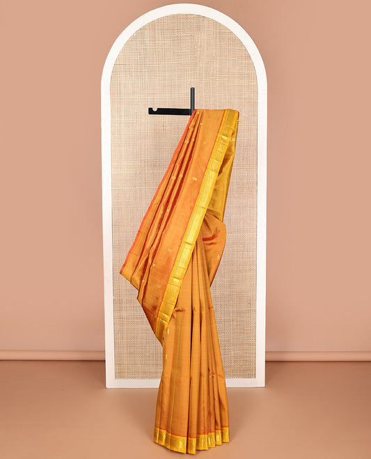 Orange floral buttas kancheepuram silk saree with contrast border of zari design border & floral design pallu