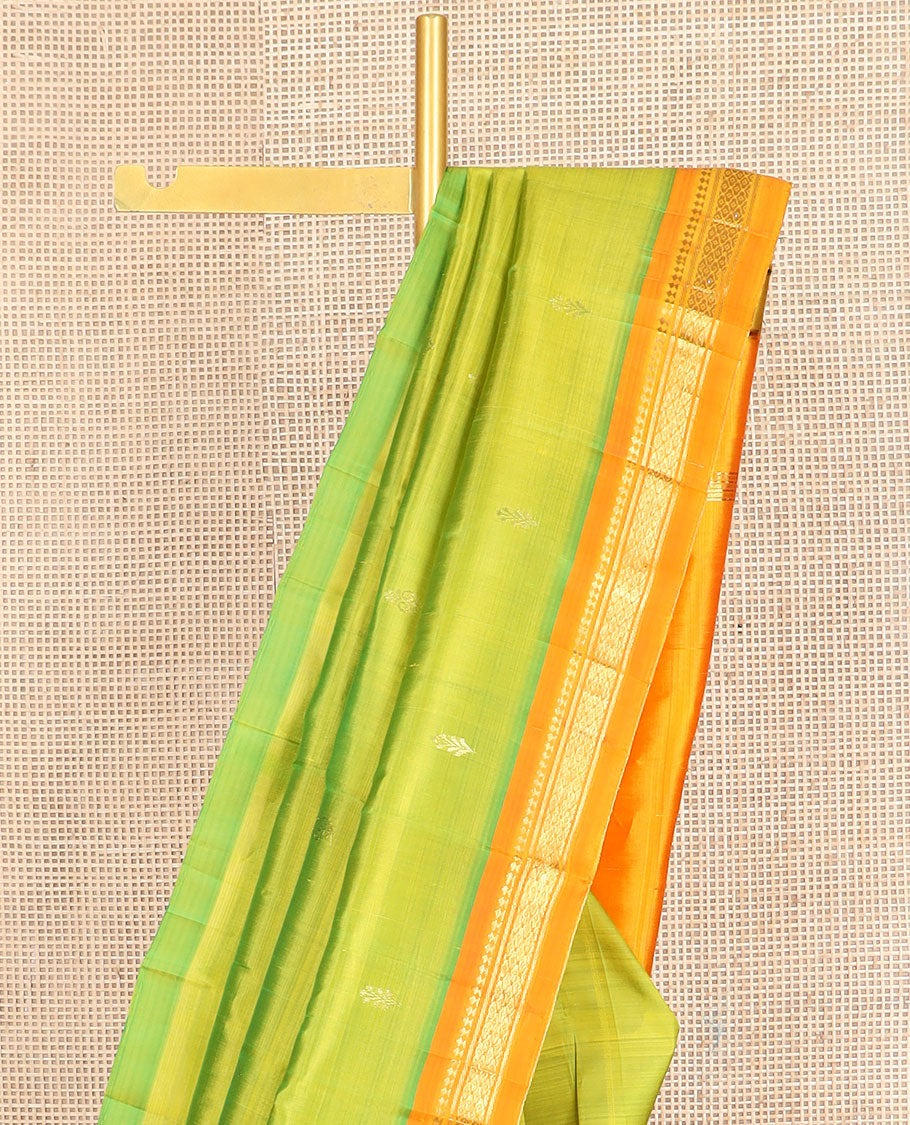Green zari buttas Kanchipuram silk saree, contrast one-sided border of paneer sombu,banaras & jaal & zari design pallu