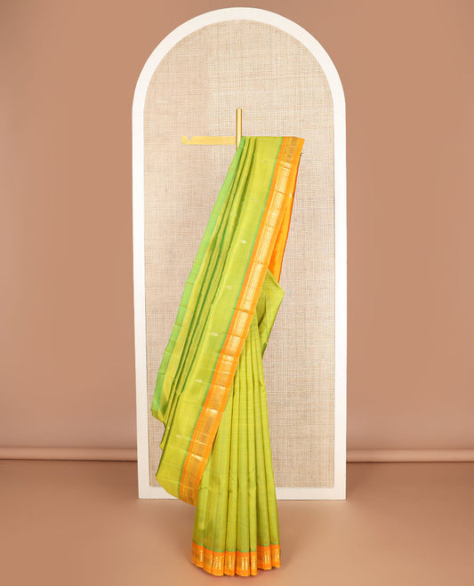 Green zari buttas Kanchipuram silk saree, contrast one-sided border of paneer sombu,banaras & jaal & zari design pallu
