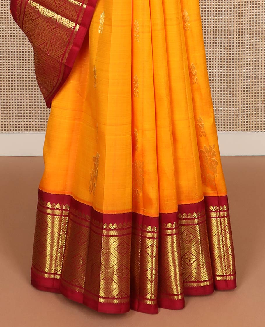 Mango yellow zari buttas kanchipuram silk saree, contrast one-sided korvai border of salngai,banaras & jaal & intricate pallu