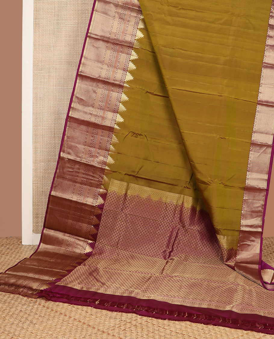 Mehendi green plain Kanchipuram silk saree, contrast border of thazampoo rekku, kathir, kamalam, diamond & mayil kann & jaal pallu