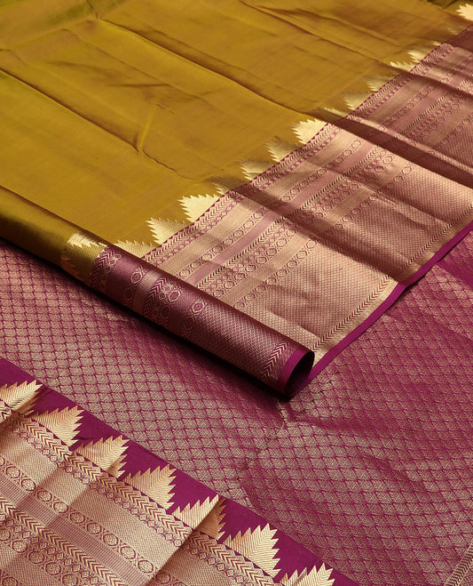 Mehendi green plain Kanchipuram silk saree, contrast border of thazampoo rekku, kathir, kamalam, diamond & mayil kann & jaal pallu