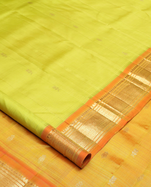 Green zari buttas Kanchipuram silk saree, contrast one-sided korvai border of thilakam mokku, banaras, and jaal design, and zari design pallu