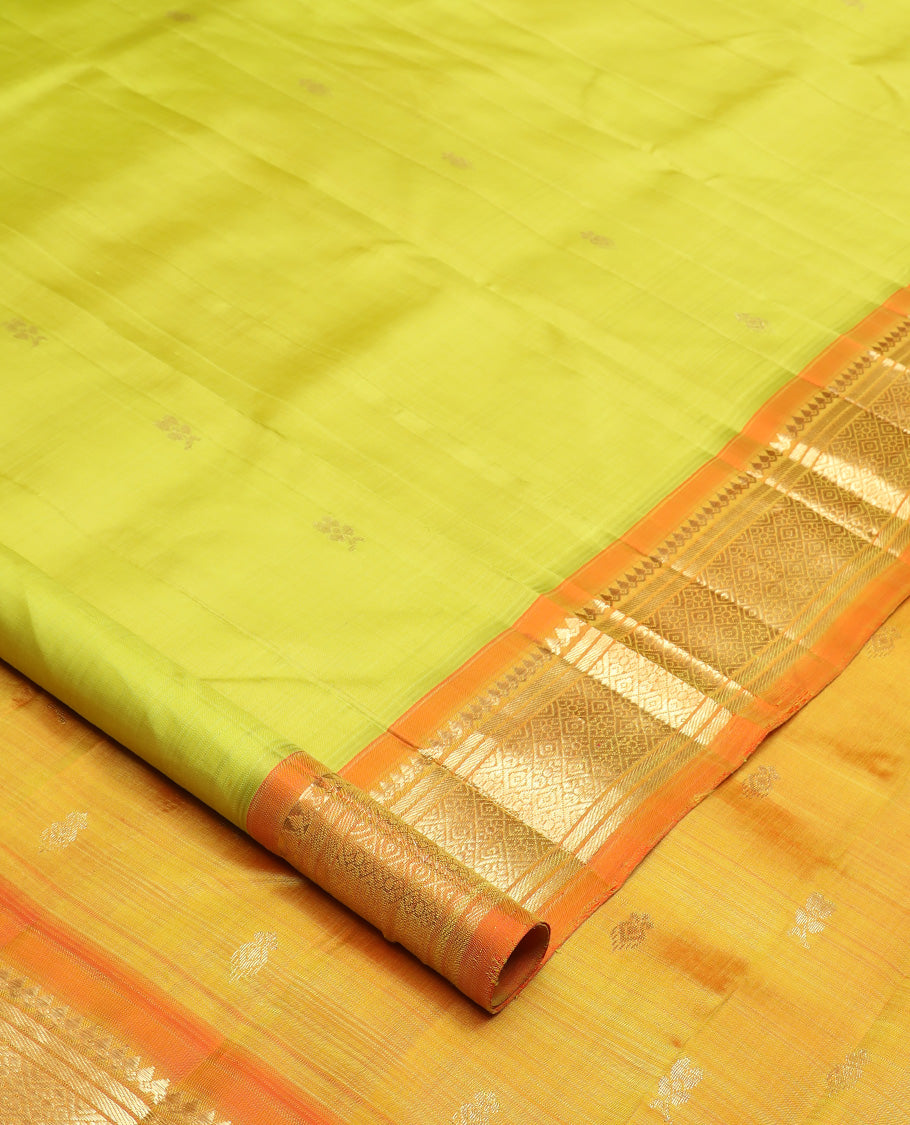 Green zari buttas Kanchipuram silk saree, contrast one-sided korvai border of thilakam mokku, banaras, and jaal design, and zari design pallu