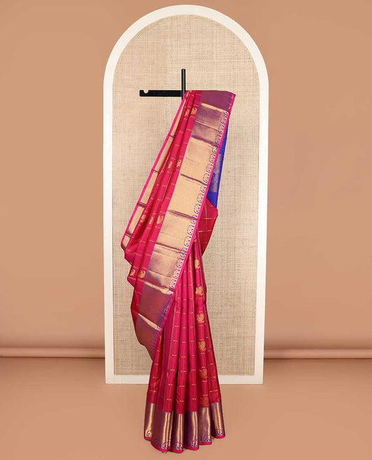 Red annam chakram buttas enclosed checked Kanchipuram silk saree, contrast border of rekku, muthu, mayil kann, and yaanai designs, and pallu of jaal, and peacock in the veena motifs