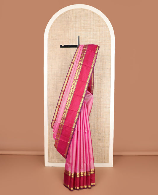 Pink striped Kanchipuram silk saree, contrast rettai pettu border of thazampoo rekku, and rudraksham designs, and zari striped pallu