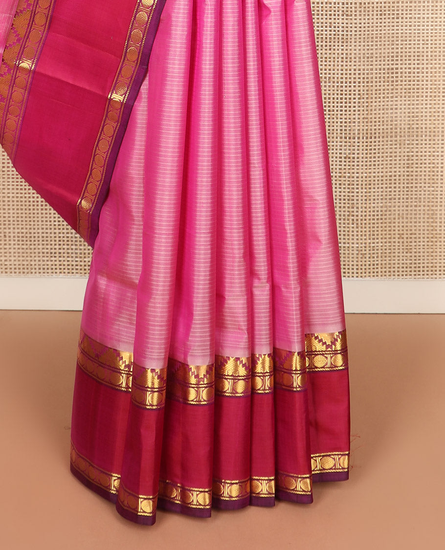 Pink striped Kanchipuram silk saree, contrast rettai pettu border of thazampoo rekku, and rudraksham designs, and zari striped pallu