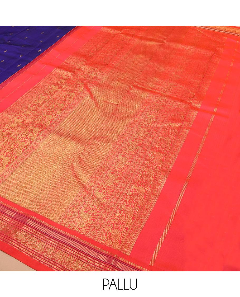 Blue zari buttas Kanchipuram silk saree, contrast border of thilakam mokku, muthu, banaras, and mayil designs, and pallu of intricate designs