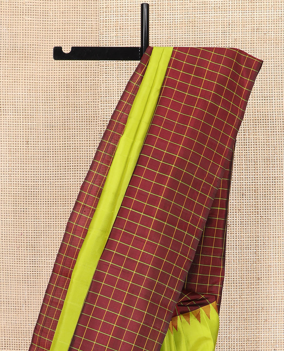 Leaf green plain Kanchipuram silk saree, contrast thazampoo rekku checked border, and checked pallu