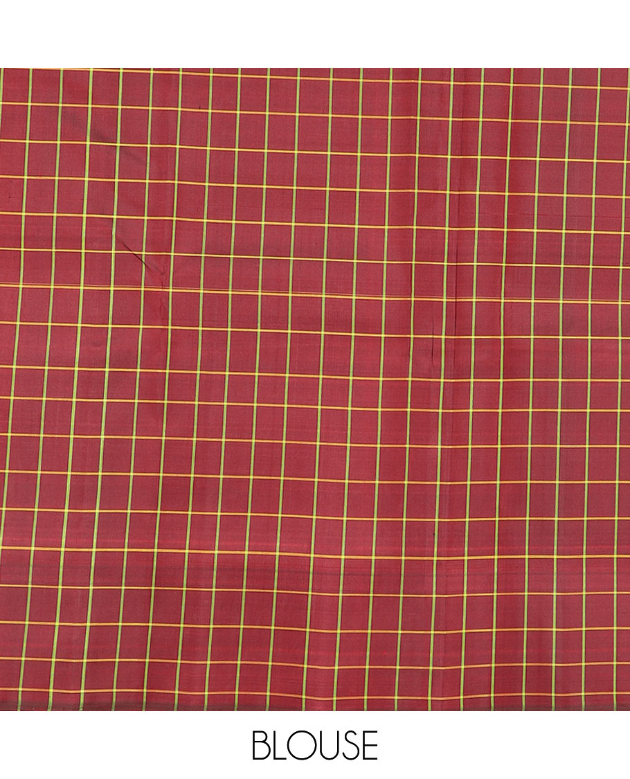 Leaf green plain Kanchipuram silk saree, contrast thazampoo rekku checked border, and checked pallu