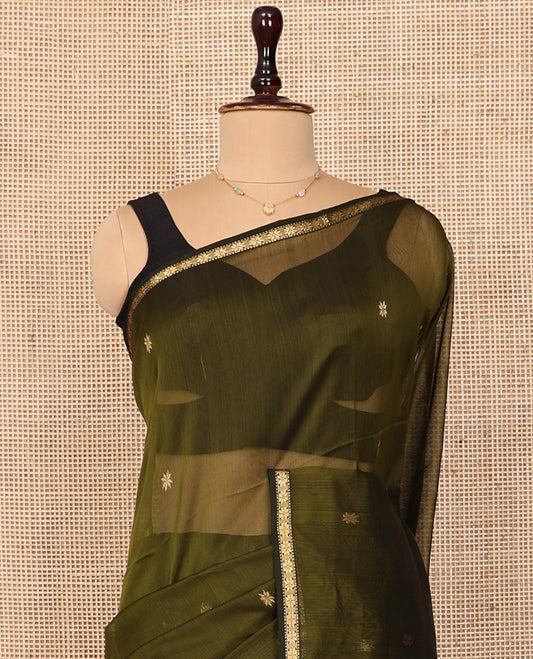 Green Maheshwari Cotton Saree, Woven with Star Buttas All Over Its Body, Complemented by a Contrast Star Motifs Zari Woven Piping Border, Pallu Steeped with Star Designs, and Paired with a Contrast Blouse