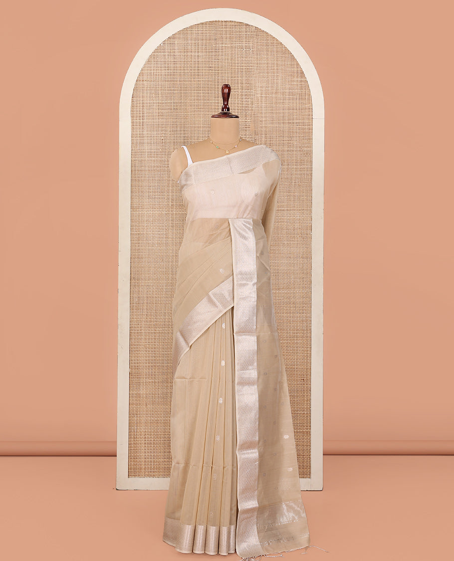 Beige Maheshwari Cotton Saree, Detailed with Flower Buttas All Over Its Body, Highlighted by Traditional Zari Design Border, Pallu Steeped with Flower Buttas, and Paired with a Matching Blouse