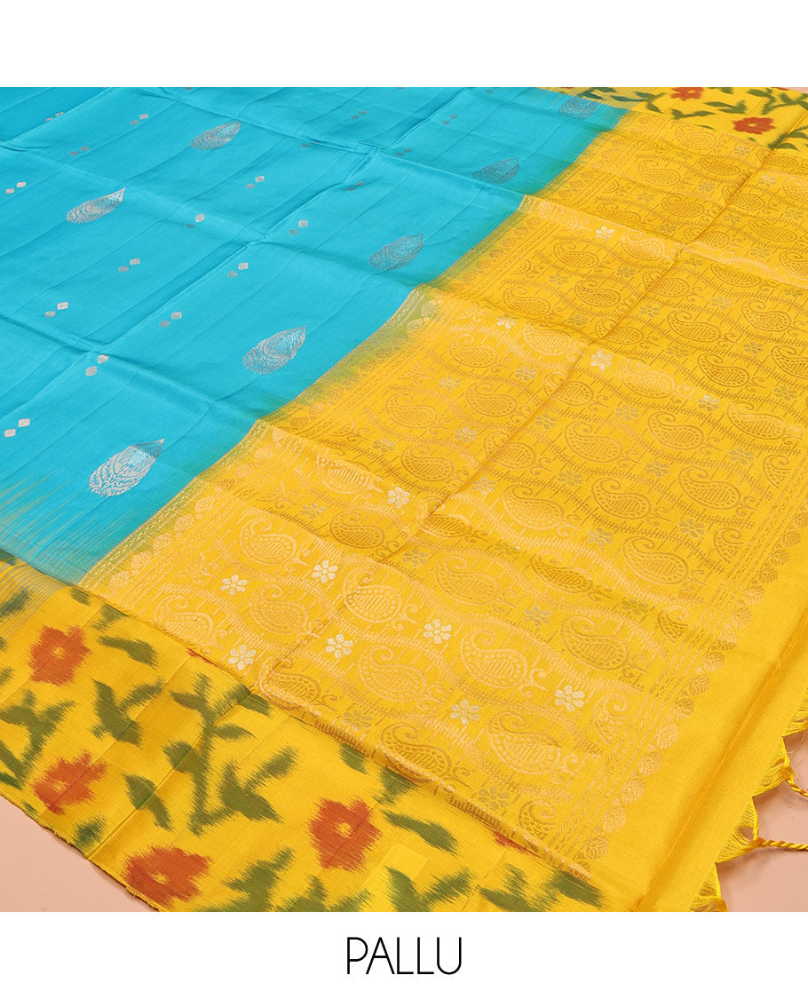 Blue Mayuri Soft Silk Saree, Elevated with Zari Buttas, Contrast Ikat Floral Border, and a Pallu Features Paisleys and a Contrast Blouse