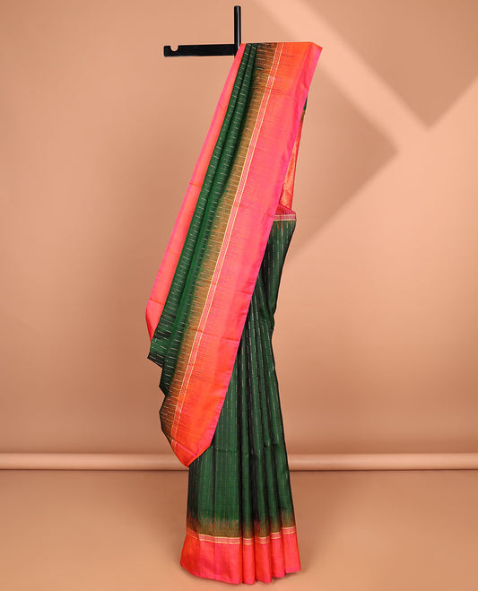 Green soft silk saree with buttas, contrast striped border & pallu of intricate designs