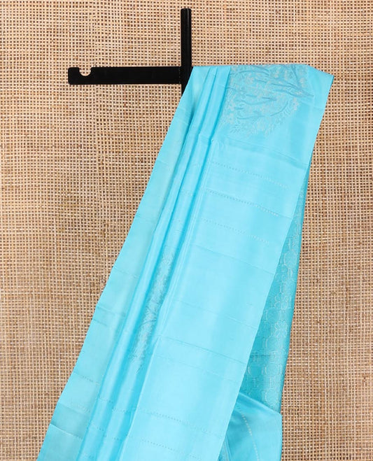 Borderless Blue Mayuri Soft Silk Saree, Sparsely Woven with Floral Buttas All Over Its Body, Subtly Woven Pallu of Floral-Rudraksham Designs, and Paired with a Matching Blouse