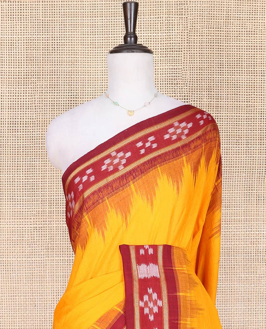 Yellow Plain Odisha Cotton Saree, Complemented by a Contrast Temple Border of Pasapalli Weaves, Pallu Features Intricate Patterns, and Paired with a Matching Blouse