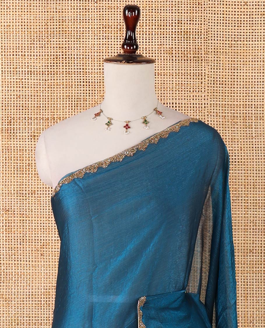 Blue fendy chiffon saree with hand work border & self pallu along with hand work blouse
