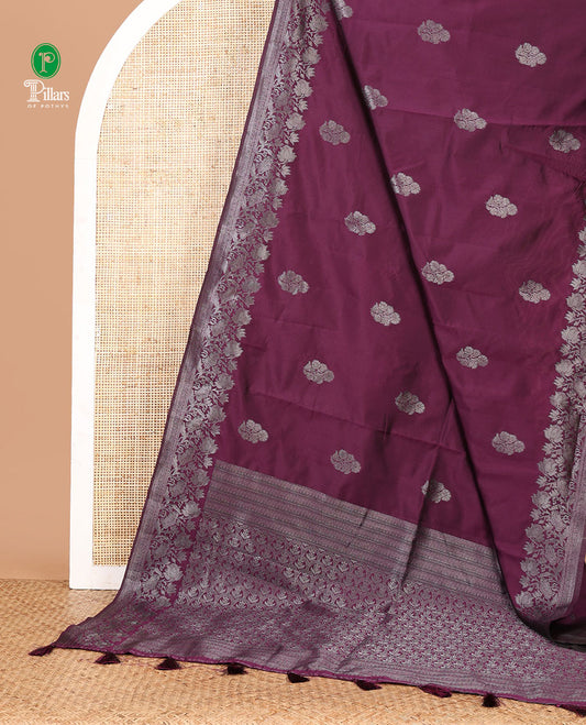 Purple kanchi silk saree with flower zari buttas across its body, zari border of floral vine & ogee patterned pallu