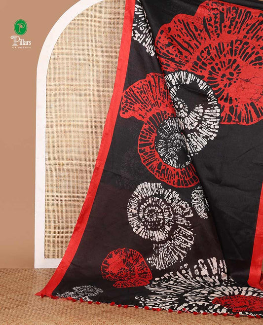 Black batik-style uniquely printed khadi cotton saree, contrast orange piping border & printed pallu