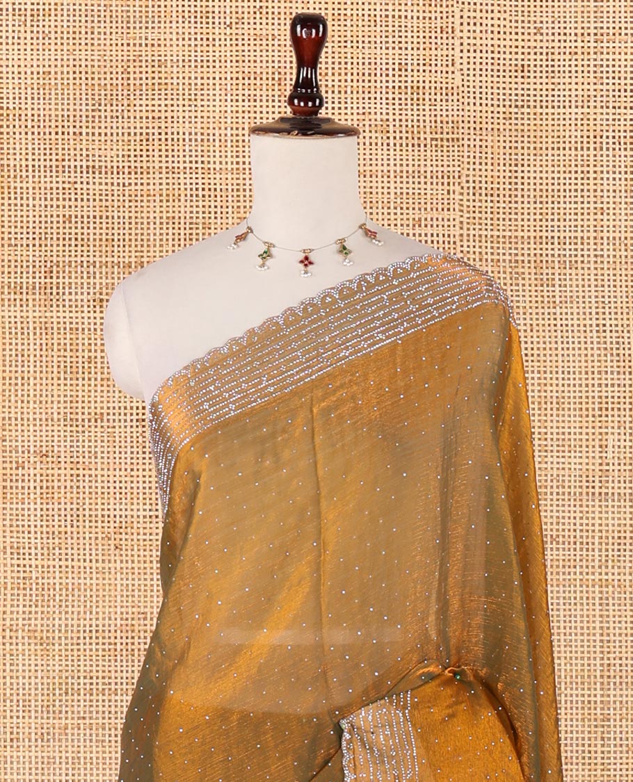 Mehendi green Swarovski crystal stonework Fendy chiffon saree,scallop stonework border & contrast purple stonework blouse