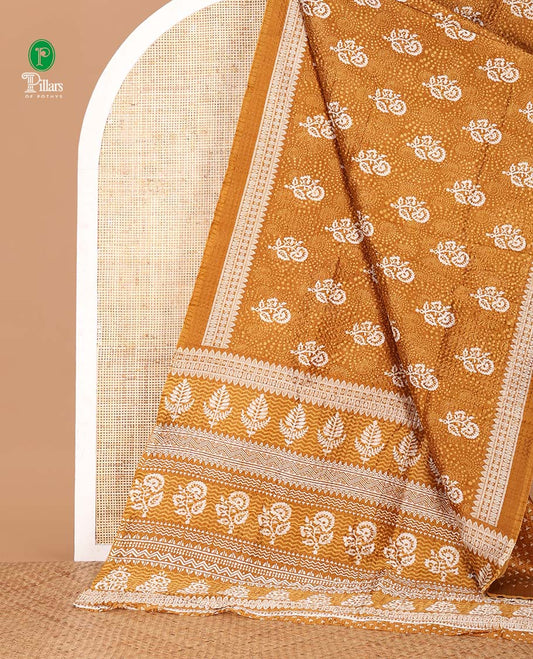 Gold floral printed litchi crushed saree, geometric printed border, floral-geometric printed pallu & triangle motif printed blouse