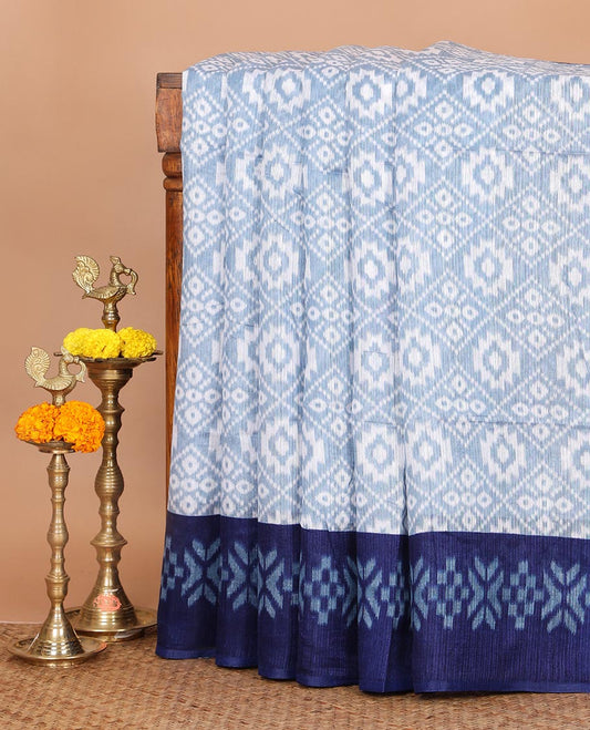 White Ikkat deisgn printed jute tussar silk saree , blue contrast border , ikkat  design printed pallu