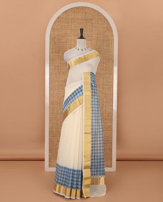 Cream with blue kerala cotton saree , diamond style printed with gold zari tissue bawanchi border & diamond pattern printed pallu with plain blouse