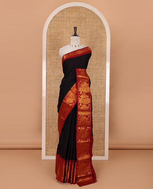 Black plain sungudi cotton saree, contrast big annam motifs woven zari border, zari striped pallu & zari design blouse